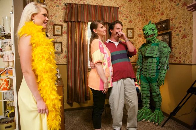 IMAGE: Behind the scenes photo with actors and green monster