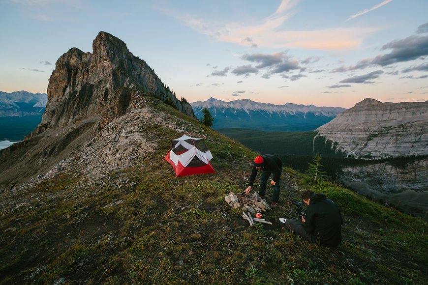 IMAGE: Photograph – tent and campfire setup