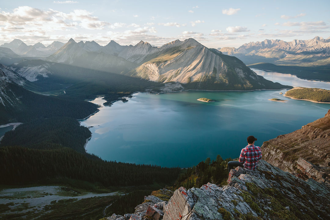 IMAGE: Photograph – Mark sitting on the cliff edge