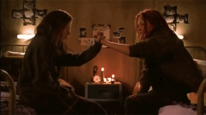IMAGE: GIF – Brigitte and Ginger clasp hands