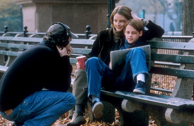 IMAGE: Fincher directing Jodie Foster and Kristen Stewart outside on bench